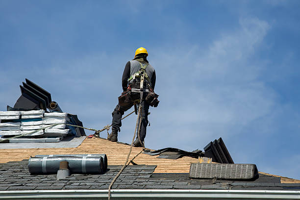 Professional Gutter Installation technician working in Waterbury Center, VT